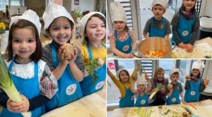 Children in chef outfits preparing food